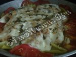 Рыба, в сметане запеченная с овощами