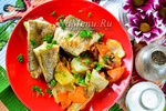 Хек с овощами в духовке