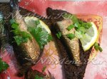 Гренки из черного хлеба со шпротами и лимоном