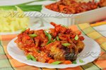 Хек в томатном соусе с овощами