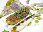 Запеченные кабачки, фаршированные мясом